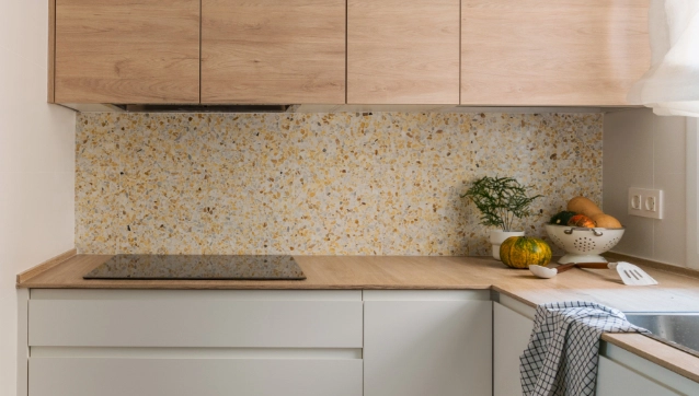 Credence of a kitchen in cream, beige and yellow terrazzo