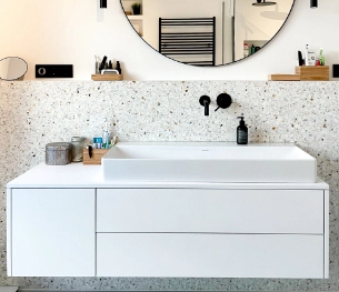 Bathroom decorated by wall terrazzo in cream and beige